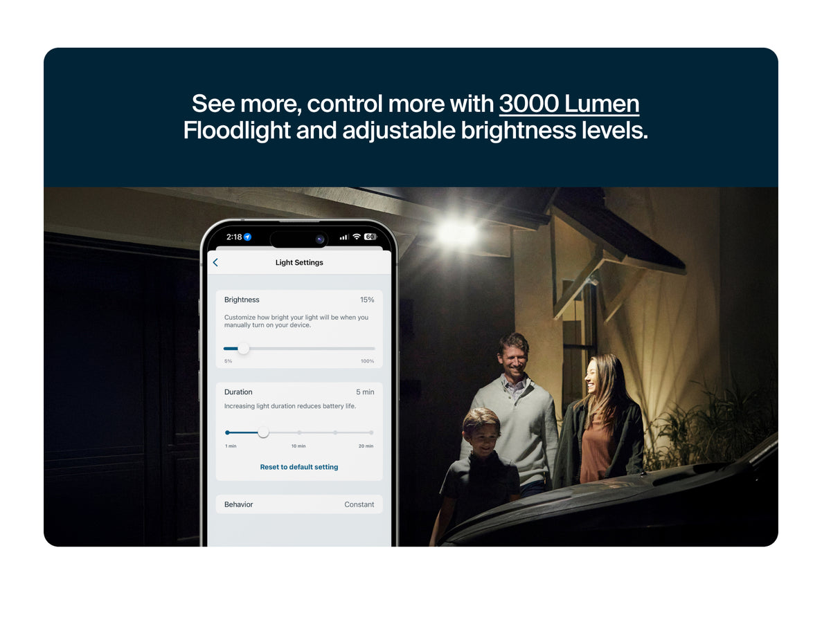 Smartphone displaying light settings on Arlo Secure app with a 3000 Lumen floodlight and adjustable brightness levels, shown in a home setting.
