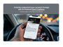 Hand holding a smartphone with AI-powered event captions displayed, inside a vehicle.